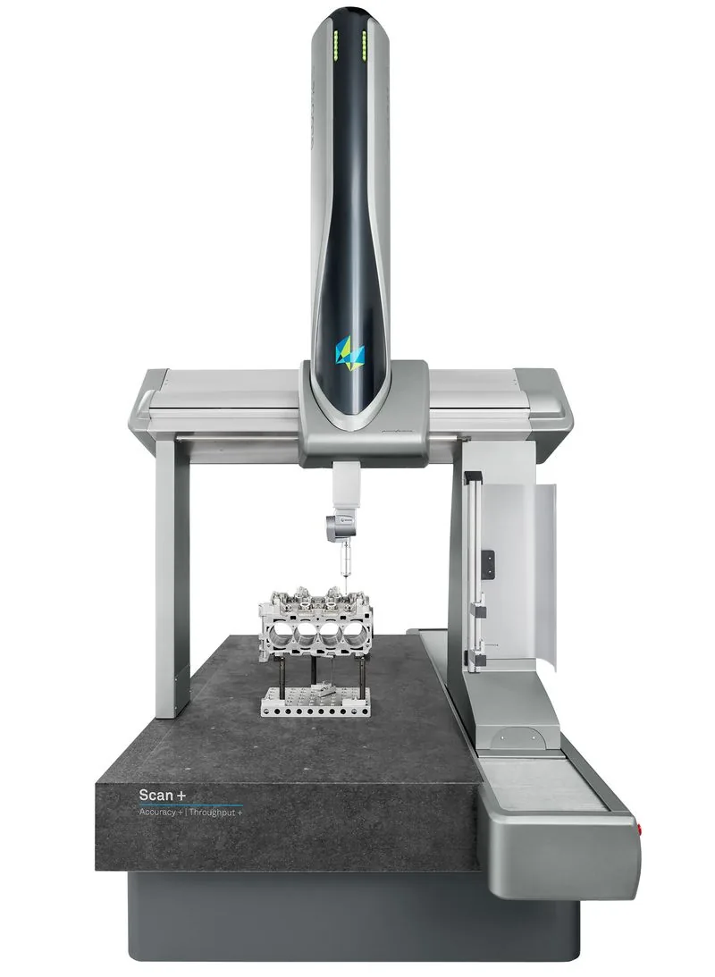 Coordinate measuring machine probing a metal part