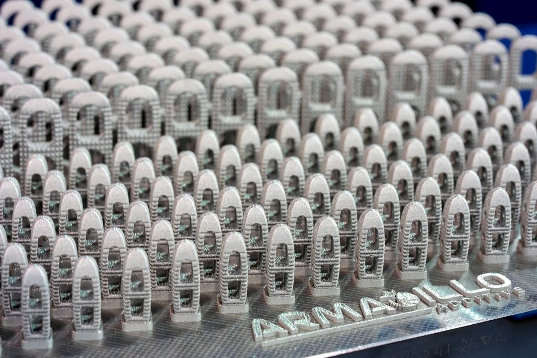 Finished medical implants printed together on the OMTEC build plate